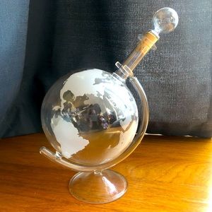 Glass globe decanter with stand